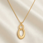 Sculptural Interlocking Oval Pendant Necklace